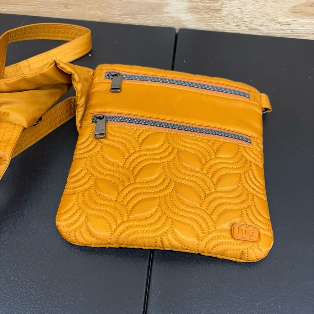 Lug Quilted Crossbody Bag in Orange